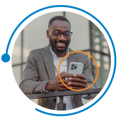 a happy employee using a smartphone